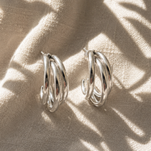 Silver triple hoop earrings with polished layered design