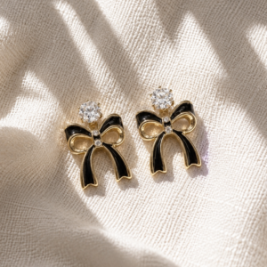 Black bow stud earrings with crystal detailing for women
