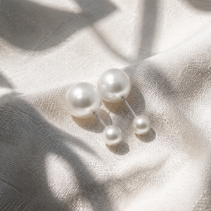 Classic Double Pearl Stud Earrings featuring a two-sided pearl design with lustrous white pearls