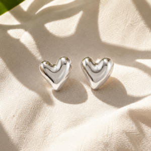 Silver heart stud earrings for women with polished minimalist design