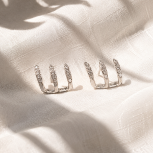 Silver crystal ear cuff stud earrings with modern layered design