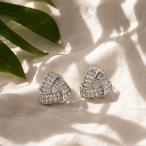 Crystal Trinity Knot Stud Earrings featuring interwoven silver-tone design with sparkling crystal embellishments