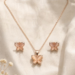 Rose gold butterfly jewelry set with matching pendant necklace and stud earrings
