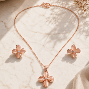 Rose gold pendant jewelry set with floral pendant necklace and matching flower earrings