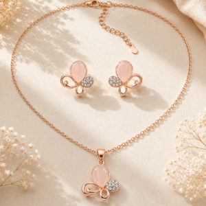 Peach Butterfly Glow Jewelry Set with rose gold pendant necklace and matching butterfly earrings featuring crystal accents