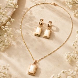 Rose gold pearl jewelry set with rectangular pendant necklace and matching drop earrings