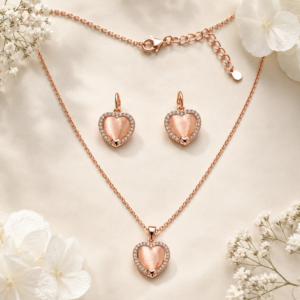 Rose Heart Glow Jewelry Set with rose gold heart pendant necklace and matching crystal heart earrings