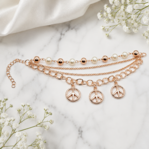 Tavielle multi-strand rose gold bracelet featuring pearl accents and peace sign charms