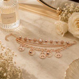 Tavielle multi-strand rose gold bracelet featuring textured beads and starfish charms