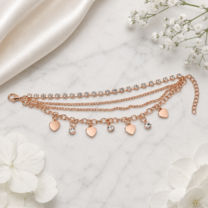 Tavielle multi-strand rose gold bracelet featuring rhinestone crystals and heart charms