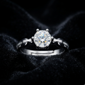 Tavielle silver ring featuring a round brilliant-cut center crystal set within a textured leaf-accented adjustable band