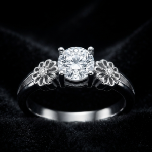 Tavielle silver ring featuring a round brilliant-cut center crystal flanked by detailed floral blossom motifs