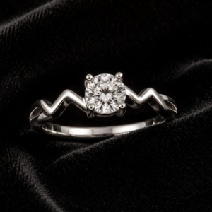 Tavielle silver ring featuring a round brilliant-cut solitaire crystal set within a unique geometric zigzag band