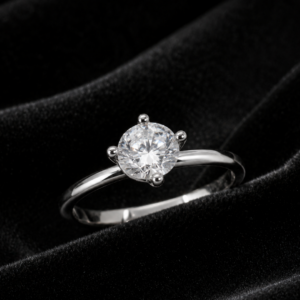 Tavielle silver ring featuring a round brilliant-cut center crystal set in a classic four-prong solitaire band